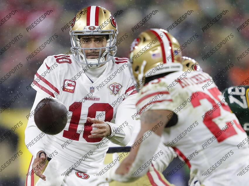 Green Bay, United States. 22nd Jan, 2022. San Francisco 49ers' Jimmy  Garoppolo (10) throws during warmups before a NFC divisional playoff NFL  game against the Green Bay Packers at Lambeau Field in